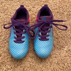 Girls size 12 Brava cleats. Like new condition.